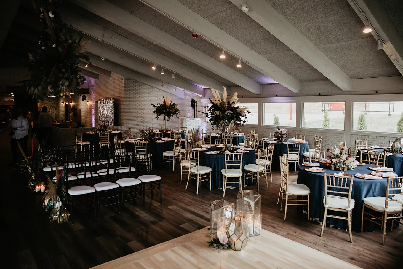 Moody, candlelit wedding ambiance in the main room at The Little Cottage