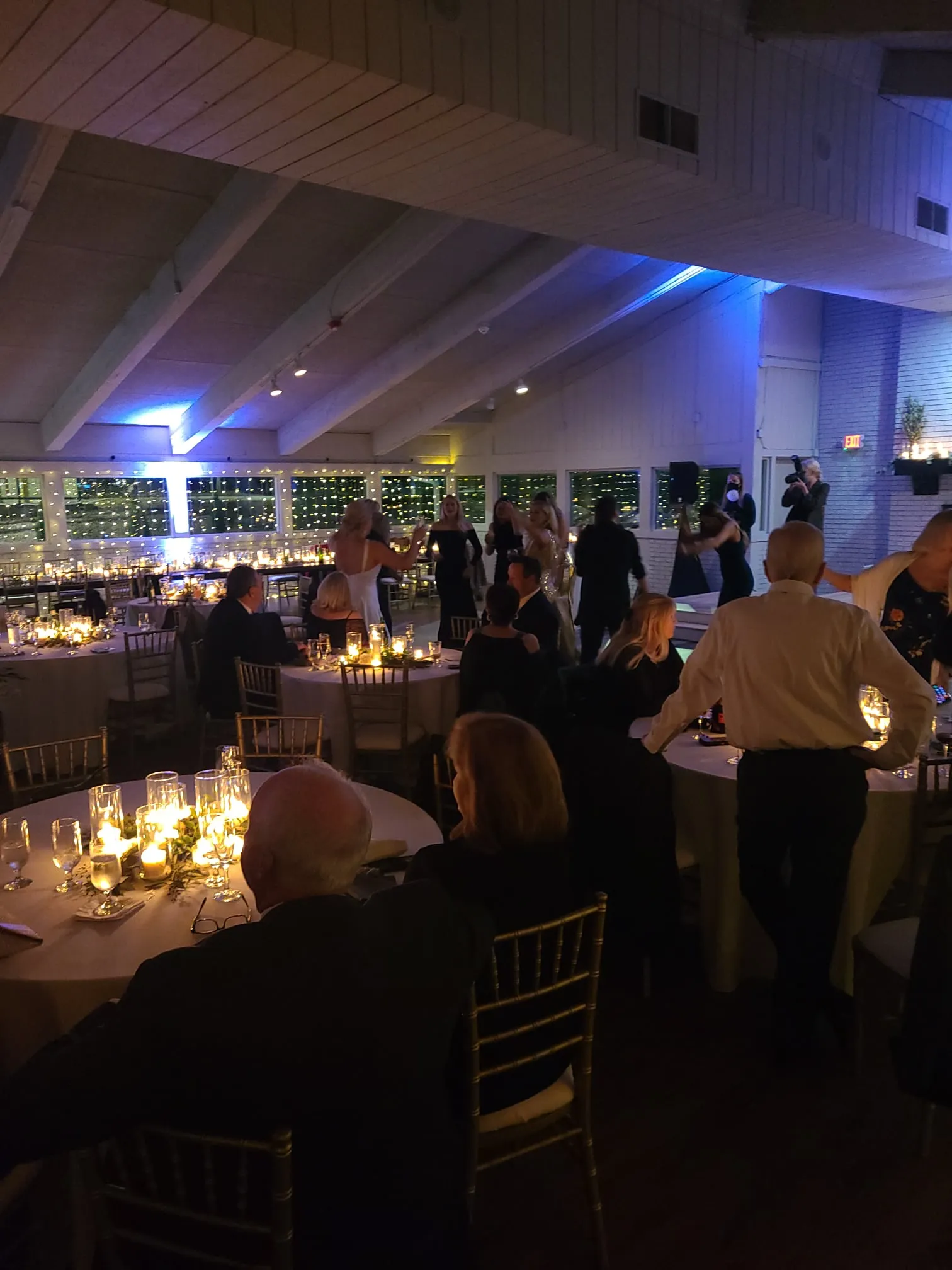 Guests gathered for a rehearsal dinner at The Little Cottage